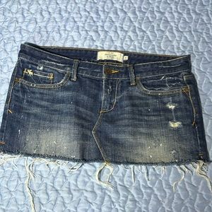 Abercrombie & Fitch Lowrise Distressed Mini Denim Skirt with paint splatter y2k